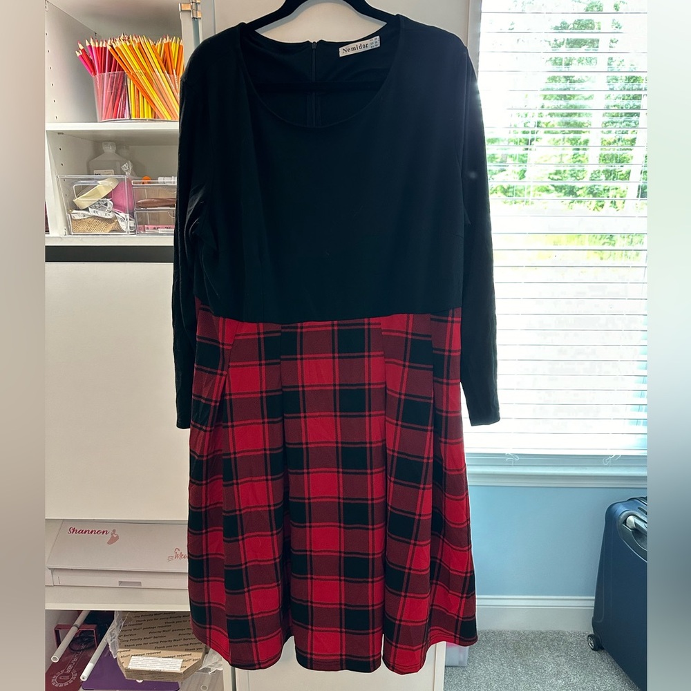Long sleeve holiday dress with red pleated skirt